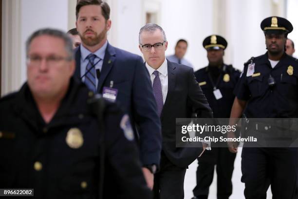 Federal Bureau of Investigation Deputy Director Andrew McCabe is escorted by U.S. Capitol Police before a meeting with members of the Oversight and...