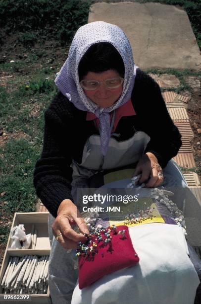 The lace maker. Almagro. Ciudad Real An artisan of the handmade lace carrying out their work in full street