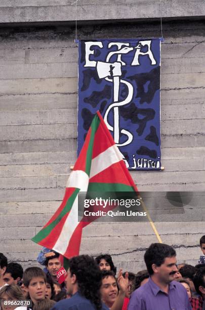 Demonstration of Herri Batasuna Basque flag and emblem of ETA in Herri Batasuna´s manifestation for the negotiation between ETA and the Government....