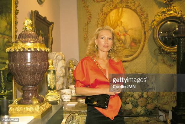 Alicia Koplowitz in the 2nd Biennail of Antiquities The financier in a stand surrounded by antiquities