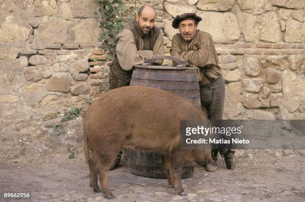 Shooting of ´La Marrana´ by Jose Luis Cuerda The actors Antonio Resines and Alfredo Landa with a pig