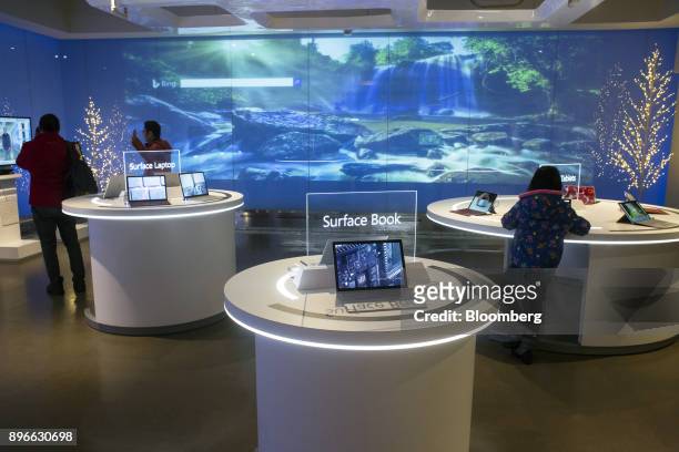 Products sit on display at a visitor center of the Microsoft Corp. Main campus in Redmond, Washington, U.S., on Tuesday, Dec. 19, 2017. In the race...