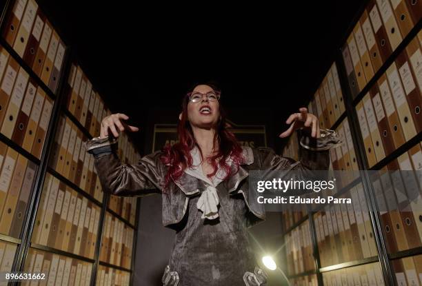 An actor performs the 'Departamento de envios extraordinarios' Christmas event presentation at Nuevos Ministerios train station on December 21, 2017...