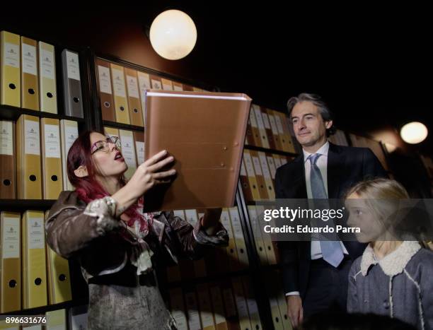 Minister of development Inigo de la Serna and an actor perform the 'Departamento de envios extraordinarios' Christmas event presentation at Nuevos...