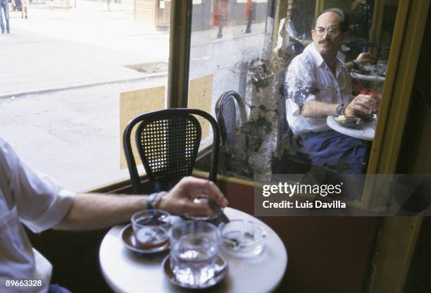 Juan Madrid, writer Juan Madrid reflected in a mirror of a bar
