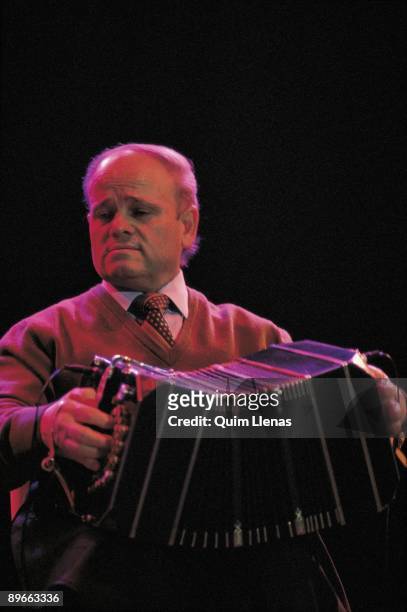 Tango concert A member of the tango band Malevaje playing the bandoneon