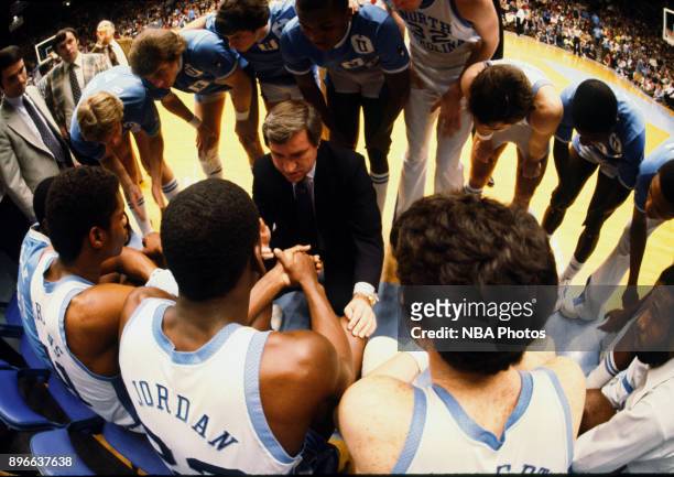 Michael Jordan of the North Carolina Tar Heels sits in the huddle against the Clemson Tigers circa 1983 in Chapel Hill, North Carolina. NOTE TO USER:...