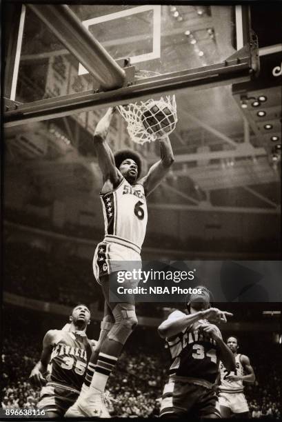 Julius Erving of the Philadelphia 76ers dunks against the Cleveland Cavaliers circa 1980 at the Spectrum in Philadelphia, Pennsylvania. NOTE TO USER:...