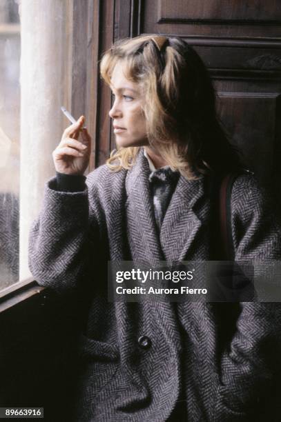 Pepa Flores, Marisol, actress Smoking a cigarette looking through a window