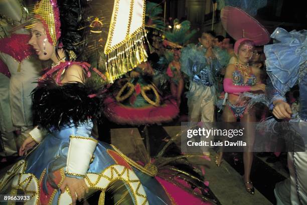 Carnivals in Tenerife Disguised people´s group parades for a street of Tenerife during the carnivals