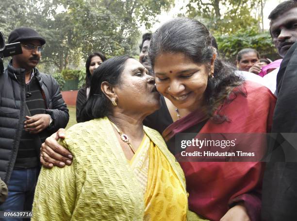 Kanimozhi celebrates with her mother Rajathi Ammal at her residence after she was acquitted by a special court in the 2G scam case on December 21,...