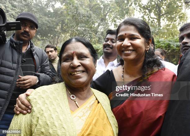 Kanimozhi celebrates with her mother Rajathi Ammal after she was acquitted by a special court in the 2G scam case,while she arrived after court at...