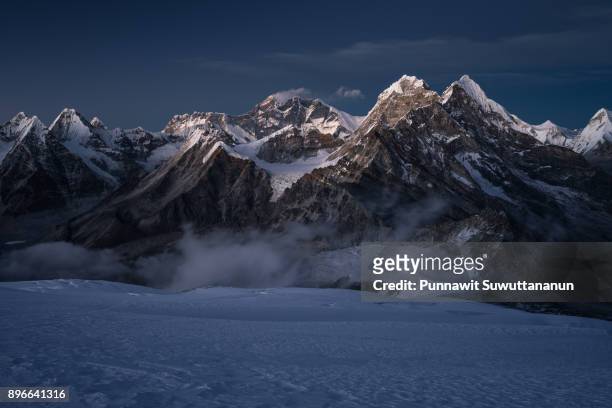 himalaya mountains view from mera peak high camp at twilight time, everest region, nepal - climbs to all time high stock pictures, royalty-free photos & images