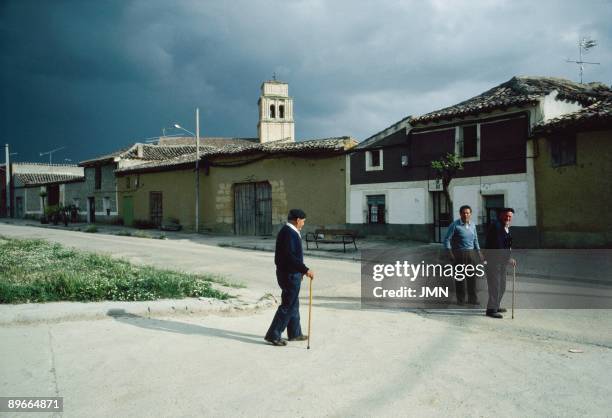 Mota del Marques, Valladolid Three old men go for a walk for a street of the Mota del Marques town. Valladolid province