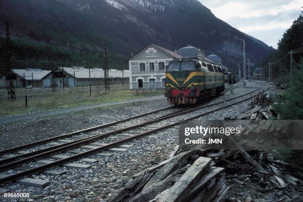 Spanish railroad in Canfranc View of a train going by Canfranc railway station in the Huesca province