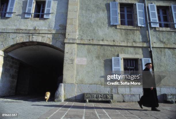 The way of Saint James. Roncesvalles. Navarra A priest walking for this city of the Pyrenees where the French pilgrims crossed to go to Santiago de...