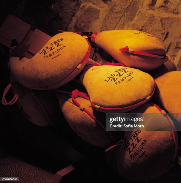 ´Hemingway´s Pamplona´. Boots of wine. Pamplona. Navarra Image of the traditional boots of wine, symbol of los Sanfermines, party that it loved the...