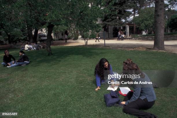 Students in the campus of Antonio de Lebrija university Seated students on the grass of the campus of the University of Antonio Lebrija, Hoyo de...