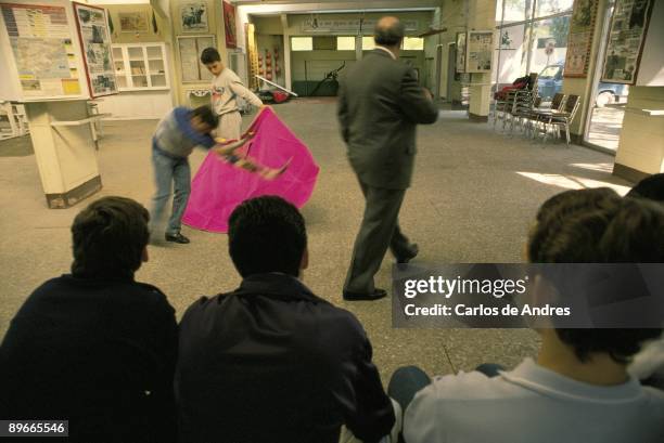 Bullfighting classes Pupils and teacher at lessons in cloak bullfighting