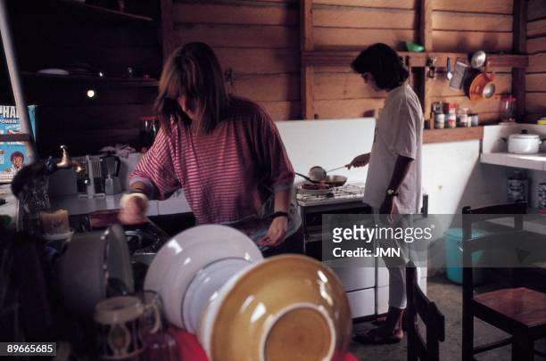 Two women cooking Two women of Doctors without Frontiers cooking in their house in the district of Nsok Nsomo