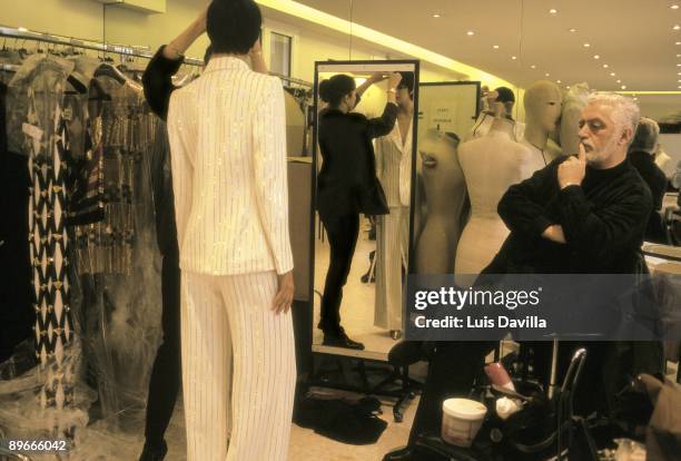 Paco Rabanne at his studio in Paris The fashion designer at a working session with a model