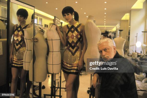 Paco Rabanne at his studio in Paris The fashion designer beside a model who wears one of his designs