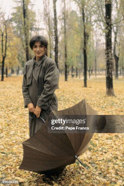 Diana Penalver, actress Diana Penalver, in a forest with an umbrella