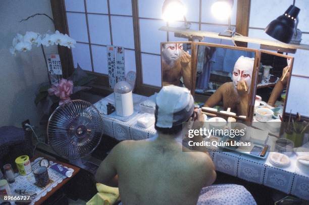 Make up session of a Kabuki actor An actor of Kabuki of the company of Ichikawa Ennosuke in a dressing room