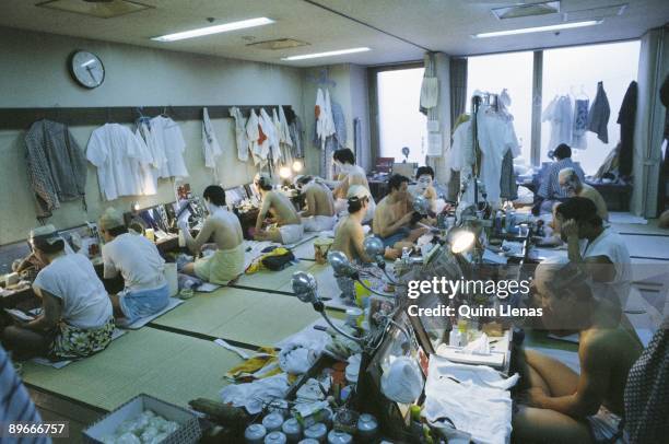 Make up session of a group of Kabuki actors Kabuki actors of the company of Ichikawa Ennosuke in the dressing rooms