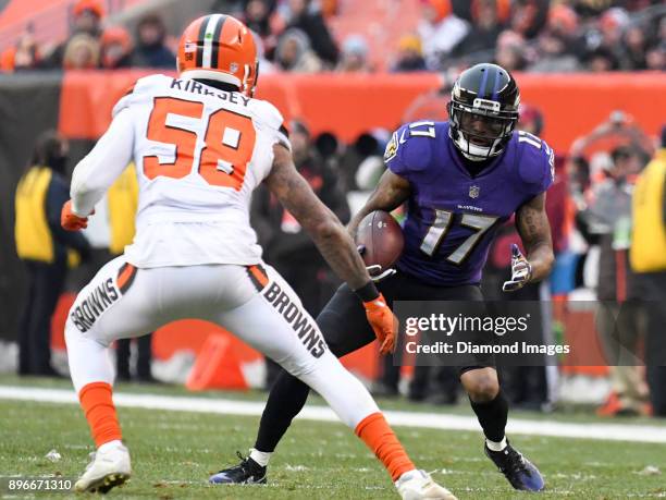 Wide receiver Mike Wallace of the Baltimore Ravens carries the ball downfield in the third quarter of a game on December 17, 2017 against the...