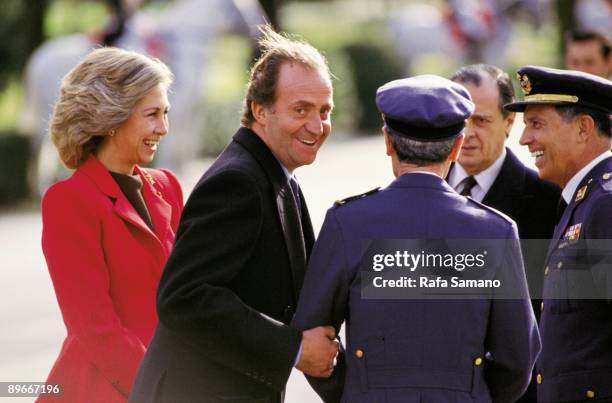 The King and the Queen of Spain with Navy officers King Juan Carlos I and Queen Sofia on a friendly conversation with Sabino Fernandez Campos and two...