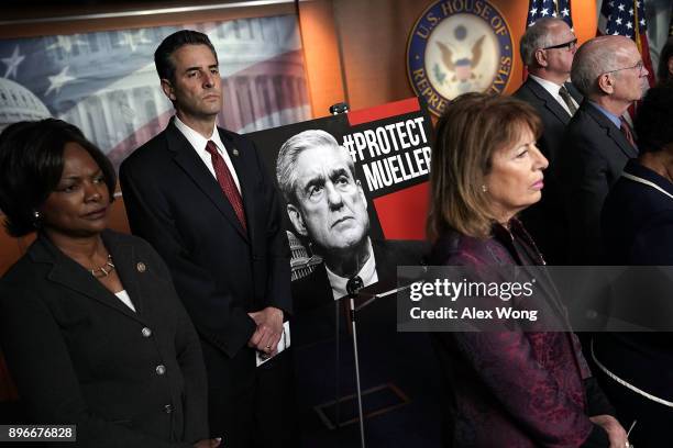 Clockwise from the left, U.S. Rep. Val Demings , Rep. John Sarbanes , Rep. Peter Welch and Rep. Jackie Speier listen during a news conference to show...