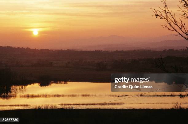 Pluvial pond View at dusk of a pluvial pond in Ullastret, Gerona province