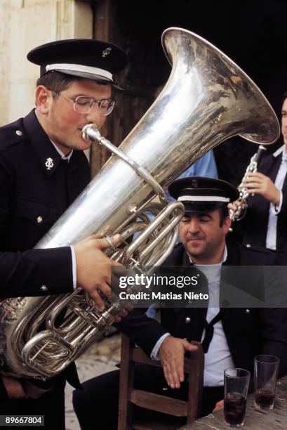 Man playing the trombone Musician of music band playing trombone in Penafiel, Valladolid province