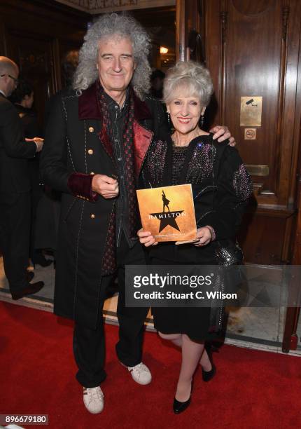 Musician Brian May with his wife actor Anita Dobson attend the opening night of 'Hamilton' at Victoria Palace Theatre on December 21, 2017 in London,...