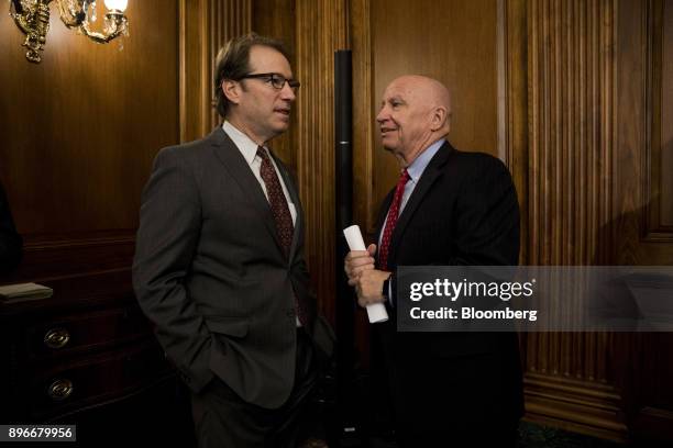 Representative Peter Roskam, a Republican from Illinois, speaks with Representative Kevin Brady, a Republican from Texas, right, prior to a Tax Cuts...