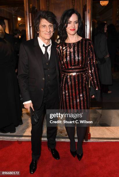 Musician Ronnie Wood with his wife Sally Humphreys attend the opening night of 'Hamilton' at Victoria Palace Theatre on December 21, 2017 in London,...