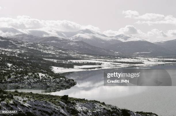 Lozoya Valley, Madrid View of the dam with the mountains snowed