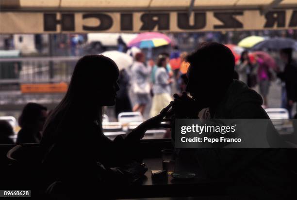 Youth couple A youth coouple holding hands in a bar