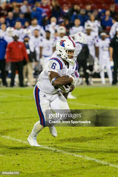 Louisiana Tech Bulldogs running back Boston Scott runs into the line during the Frisco Bowl between SMU and Louisiana Tech on December 20 at Toyota...