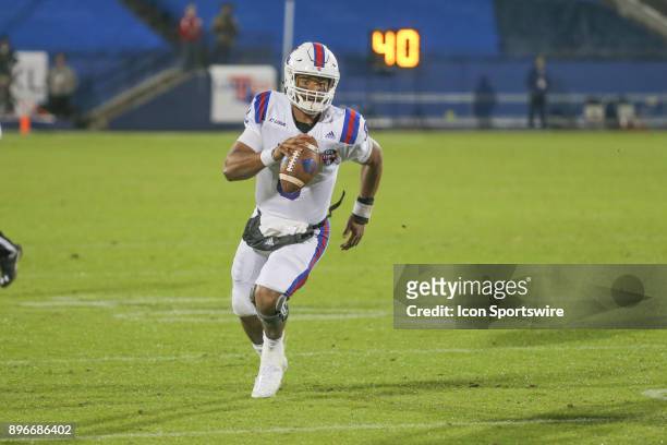 Louisiana Tech Bulldogs quarterback J'Mar Smith rolls out during the Frisco Bowl between SMU and Louisiana Tech on December 20 at Toyota Stadium in...