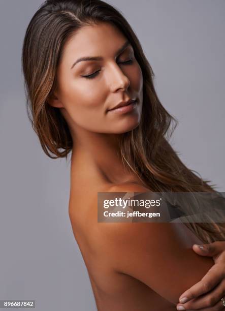 glowy skin that's gorgeously stunning - tanned body stock pictures, royalty-free photos & images