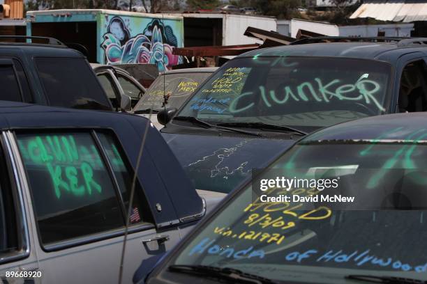 Cars that were turned in through the Cash for Clunkers federal program bear identifying marks at Aadlen Brothers Auto Wrecking junkyard on August 7,...