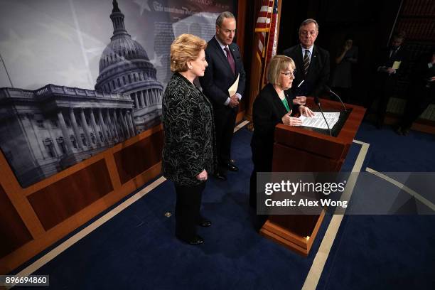 Clockwise from lower right, U.S. Sen. Patty Murray speaks as Sen. Debbie Stabenow , Senate Minority Leader Sen. Chuck Schumer and Senate Majority...