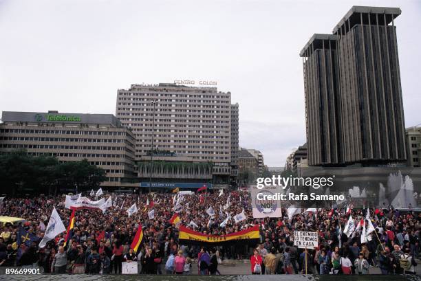 Manifestation against the American military bases. View of people with banners during the manifestation against the American military bases in Madrid.