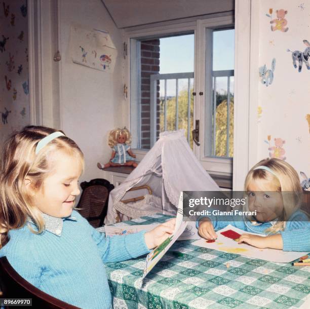 Zarzuela Palace, Madrid. 1969 Elena and Cristina of Borbon drawing in their room.