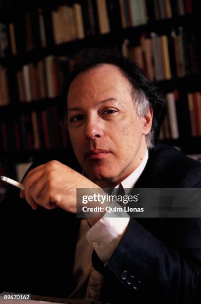 Javier Marias. Writer. In his home in Madrid smoking a cigarette