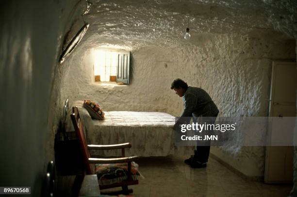 Spain. Granada. Orce. Josefa in their cave-house .