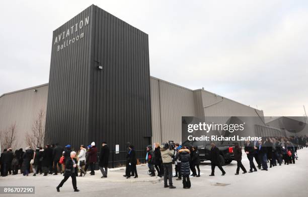 Mourners lined up early to make their way to the front doors of the hall. Thousands came out to the International Centre for the memorial for...