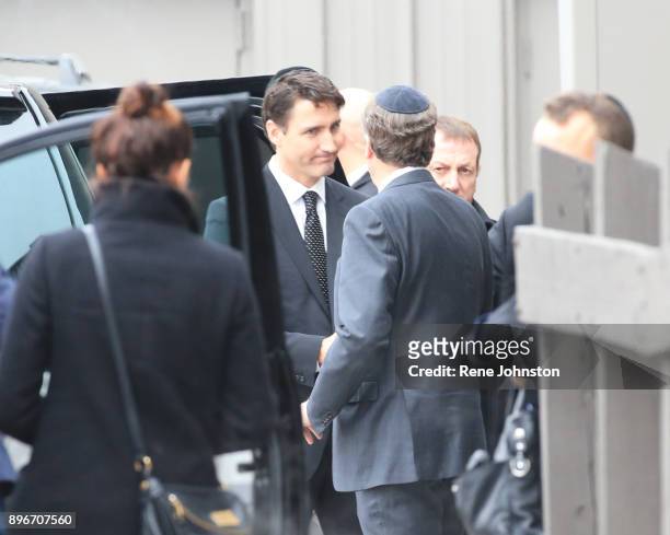 Sherman Funeral Prime Minister Trudeau shakes Toronto Mayor Tory's hand as they prepare to leave after paying their respects to Honey and Barry...